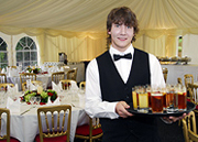 Waiter serving drinks